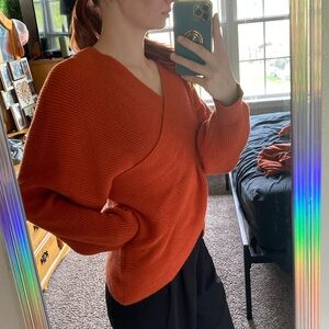 Criss cross open back women’s sweater